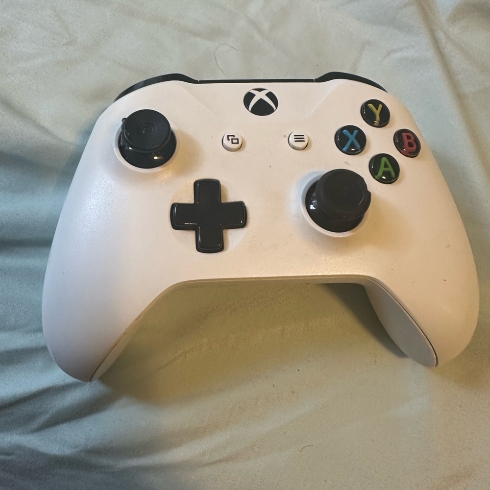 White and Black Wireless Gaming Controller with Ergonomic Design